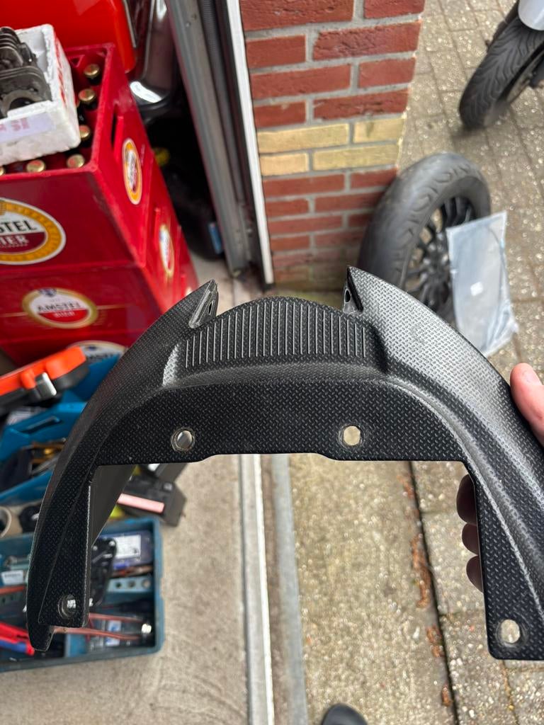 Zip achter spoiler, Ophalen