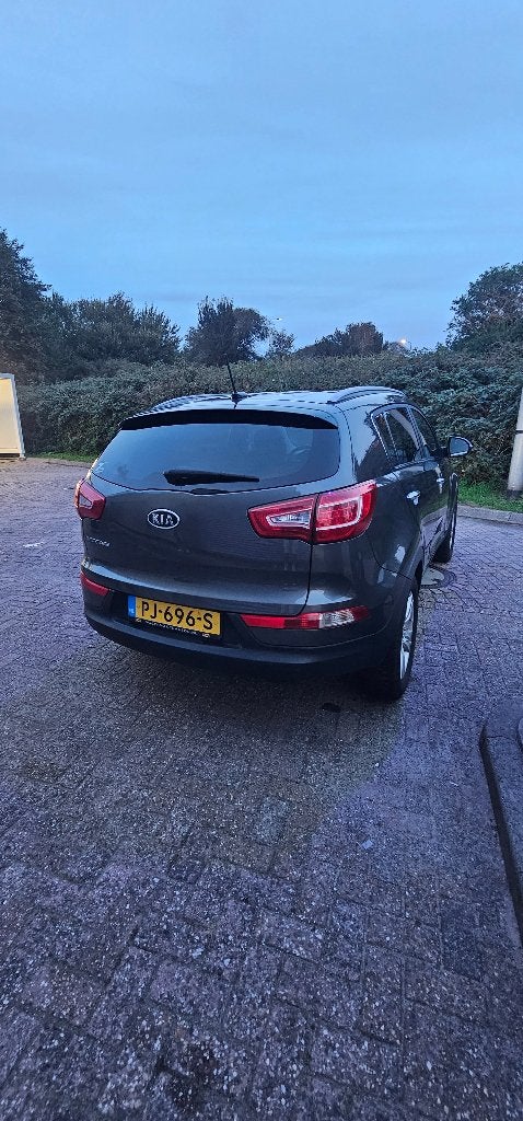 Kia Sportage 1.6 GDI 2WD 2012 Grijs, Auto's, Voorwielaandrijving, Euro 5, 15 km/l, 1280 kg