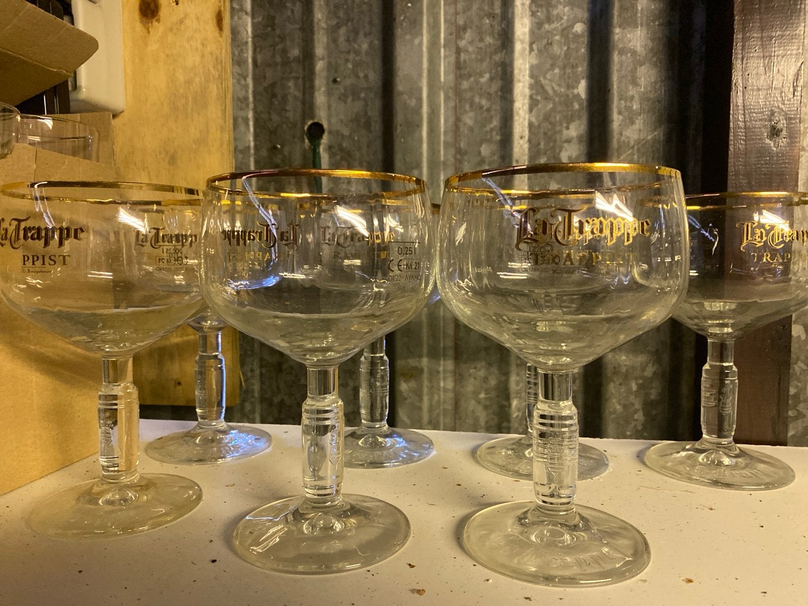 Set van 7 La Trappe bierglazen met gouden rand, Antiek en Kunst, Ophalen
