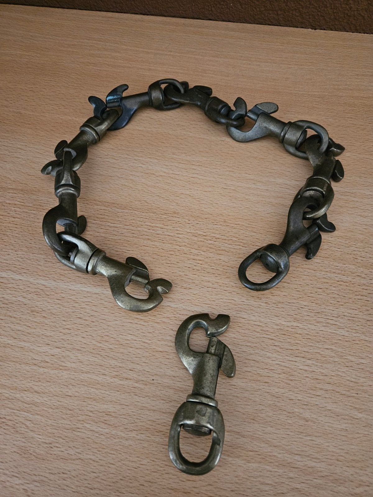 Antieke messing karabijnhaken musketonhaak. 9 stuks, Antiek en Kunst, Antiek | Koper en Brons, Ophalen of Verzenden