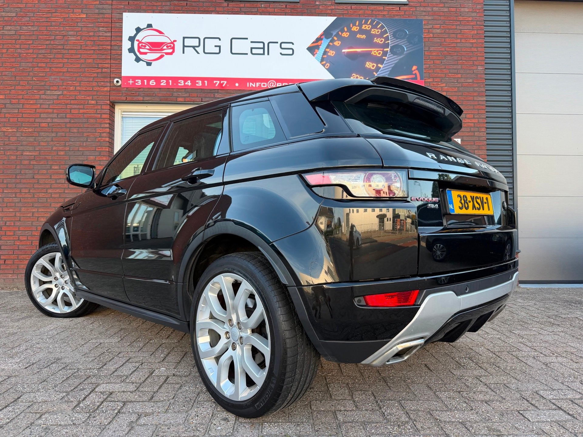Land Rover Range Rover Evoque 2.0 Si 4WD Prestige / Leder /, Auto's, Automaat, Euro 5, 4 cilinders, Met garantie (alle)