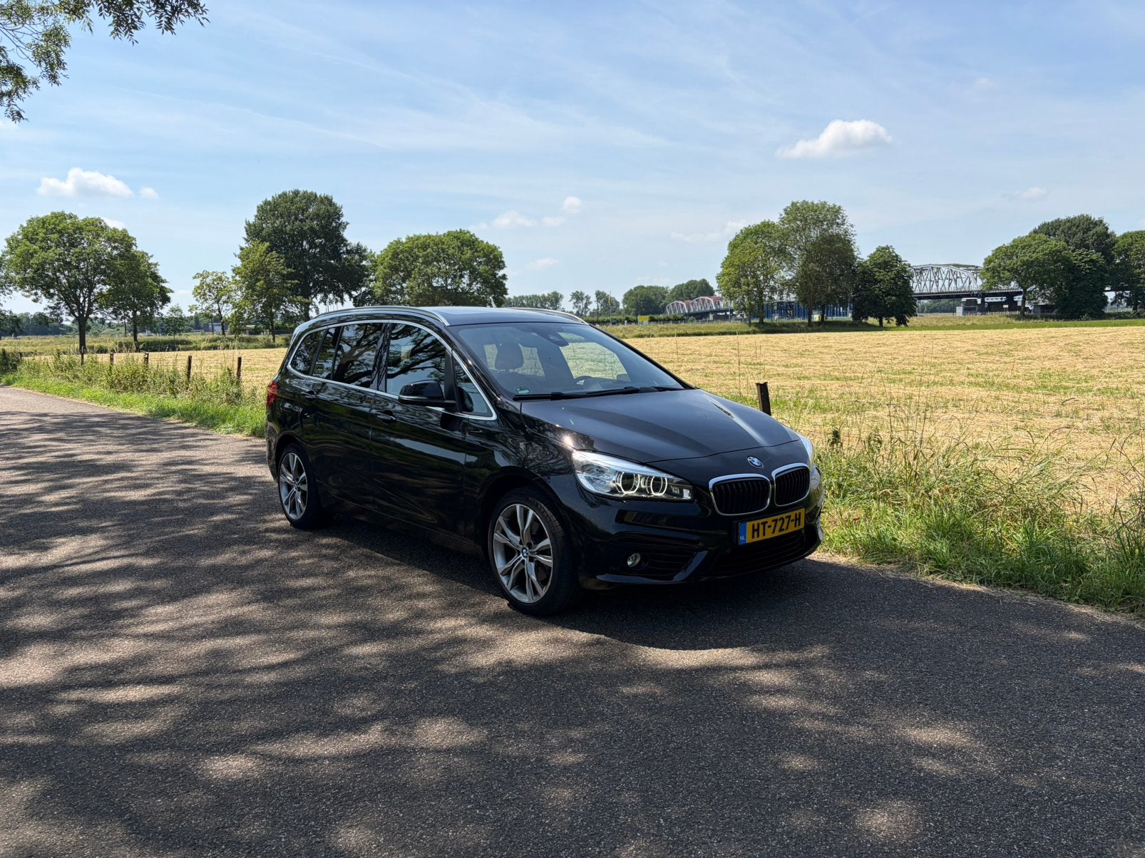 BMW 2-Serie Gran Tourer 1.5 218I AUT 2016 Zwart, Auto's, 136 pk, Zwart, 2-Serie Gran Tourer, 7 stoelen