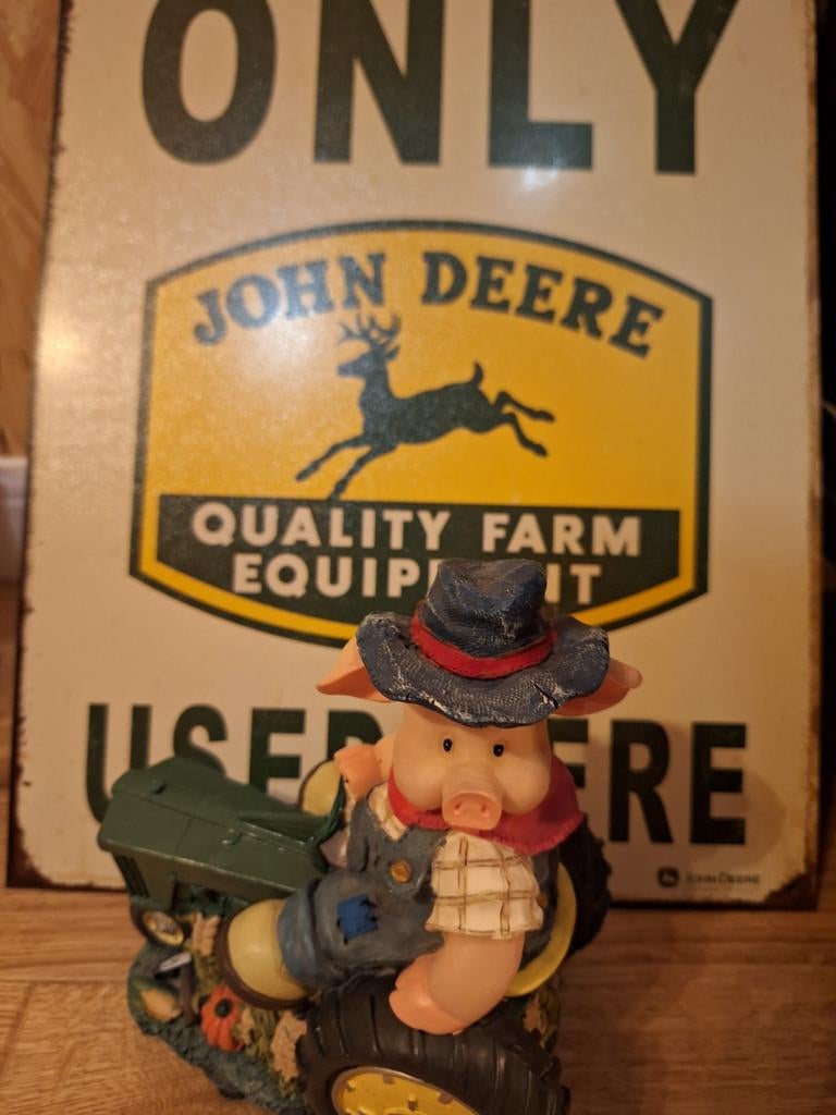 John deere met varken, Ophalen