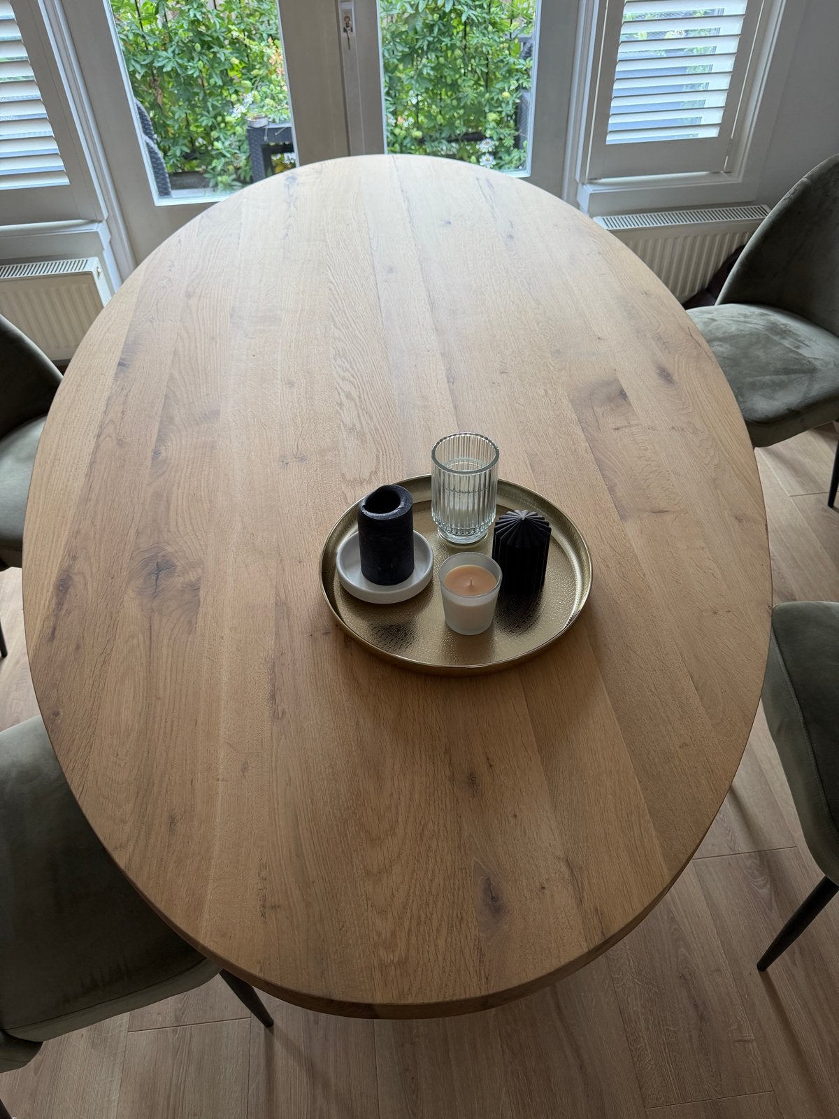 Ovale eettafel van eikenhout met metalen onderstel, Huis en Inrichting, Tafels | Eettafels, Ophalen, 100 tot 150 cm, Eikenhout