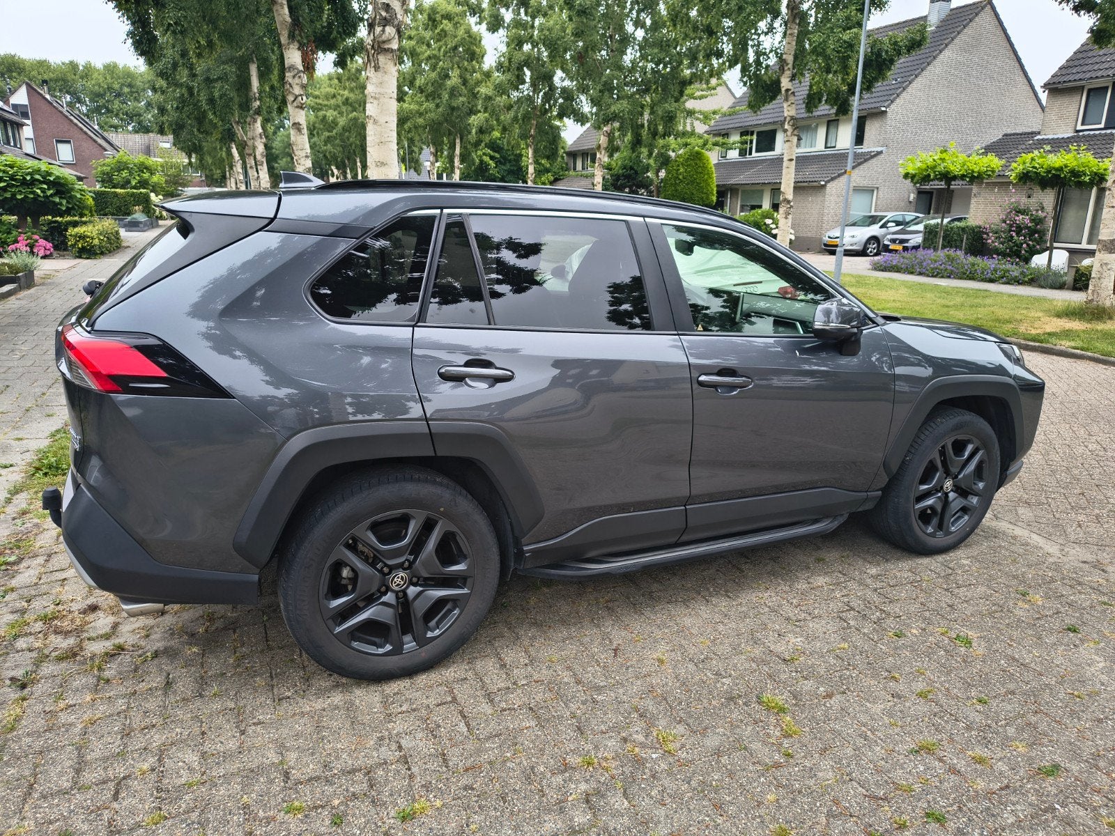 Toyota Rav4 2.5 Hybrid ADVENTURE 222pk CVT AWD 2022 Grijs, Auto's, Toyota, Automaat, Startonderbreker, Zwart, 4 cilinders