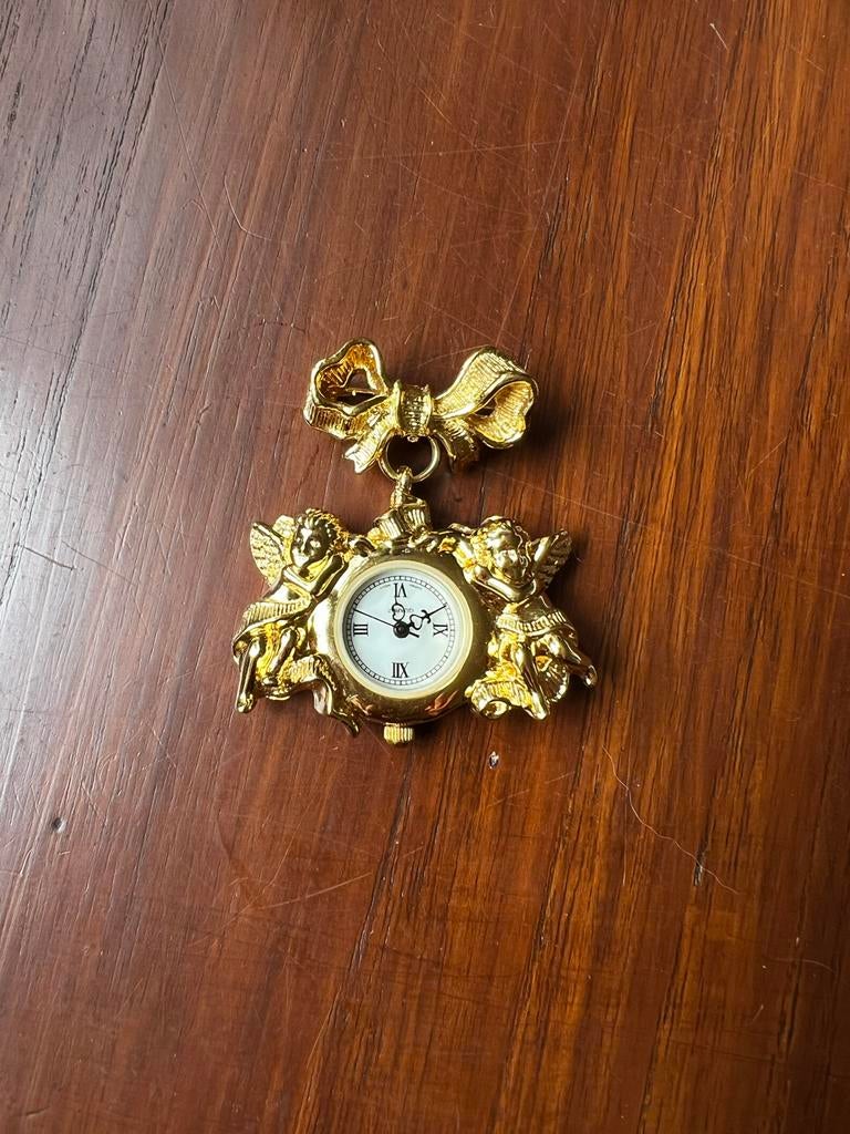 Vintage Avon Engelen Broche/Horloge Goudkleurig, Overige materialen, 4 tot 7 cm, Ophalen of Verzenden, Zo goed als nieuw