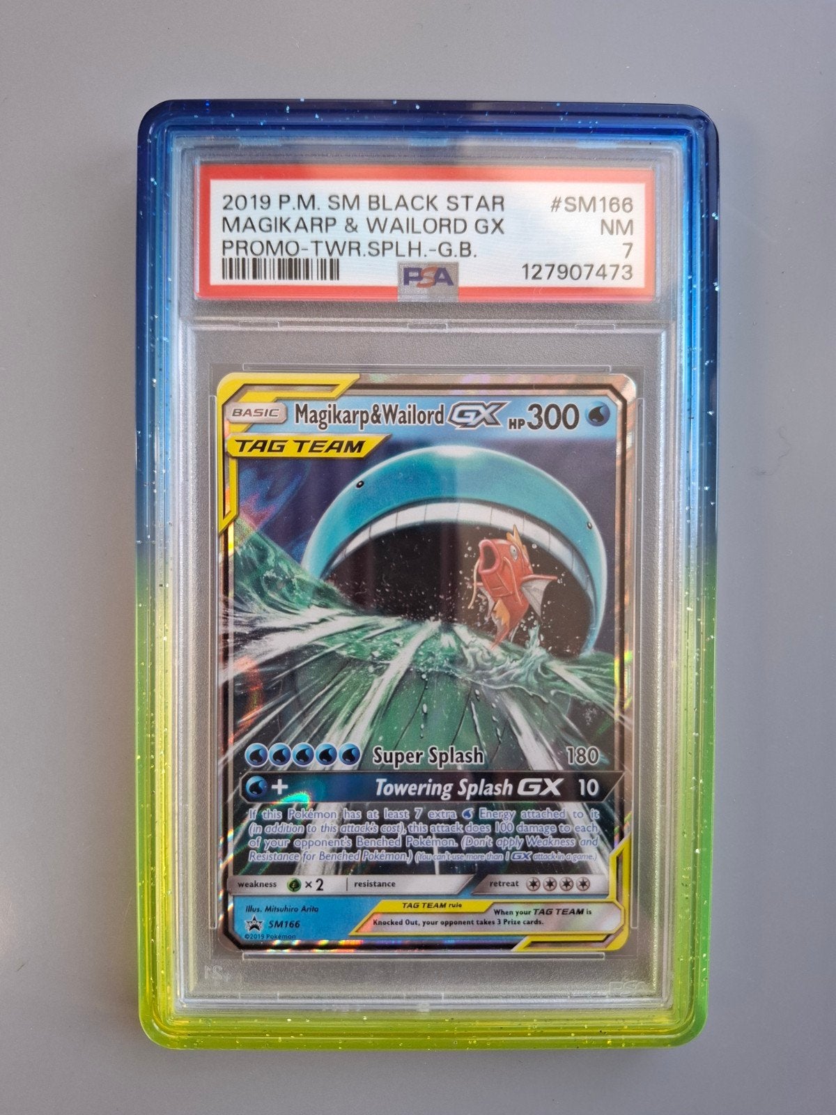 Pokemon Magikarp & Wailord GX Promo SM166 PSA 7, Hobby en Vrije tijd, Verzamelkaartspellen | Pokémon, Ophalen of Verzenden, Zo goed als nieuw