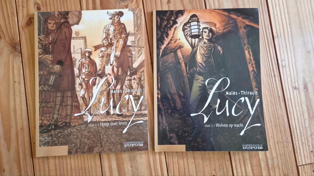 Lucy Deel 1 & 2 - Stripboekenreeks, Meerdere stripboeken, Ophalen of Verzenden, Zo goed als nieuw, Malès, Thirault