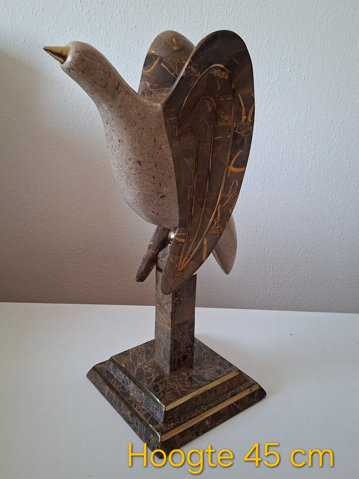 Stenen beeldje/ sculptuur van een vogel, Ophalen