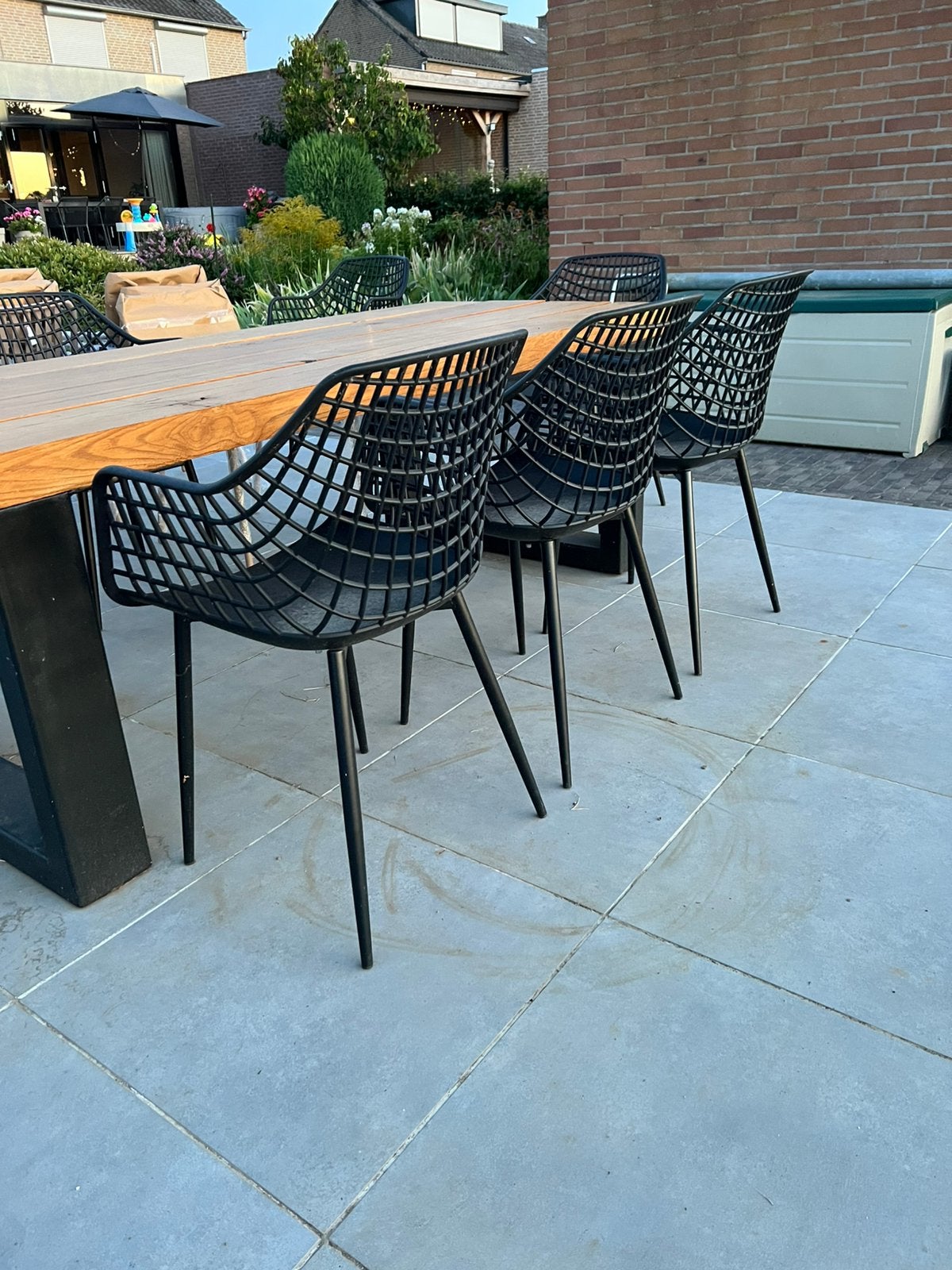 8 zwarte Webbing tuinstoelen