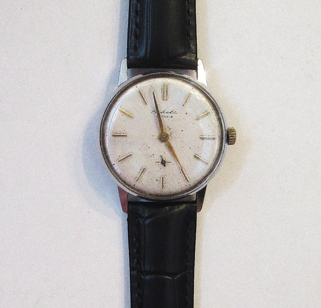 Vintage RAKETA mechanisch herenhorloge, made in USSR, de 70., Ophalen of Verzenden, Staal, Overige merken, 1960 of later