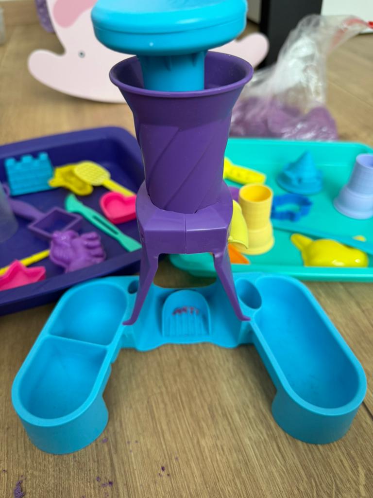 Kinetic zand en speelgoed, Ophalen