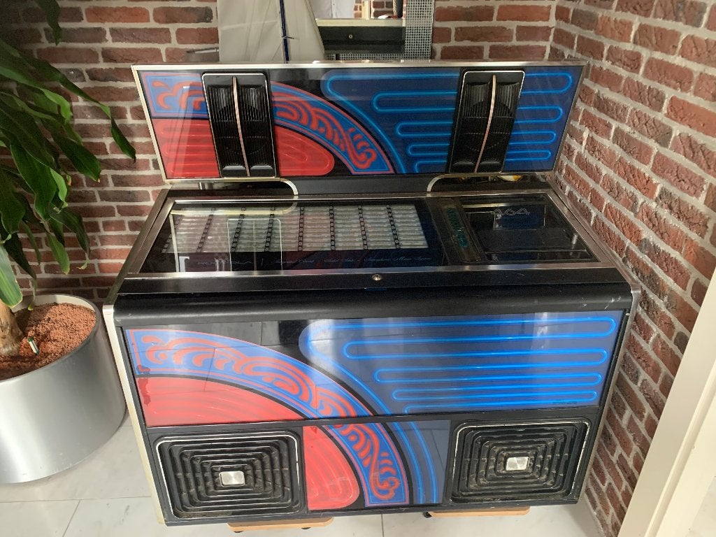 Jukebox Rock Ola 464, heel veel singles, ik denk wel 100., Gebruikt, Rock Ola, 1970 tot heden, Ophalen