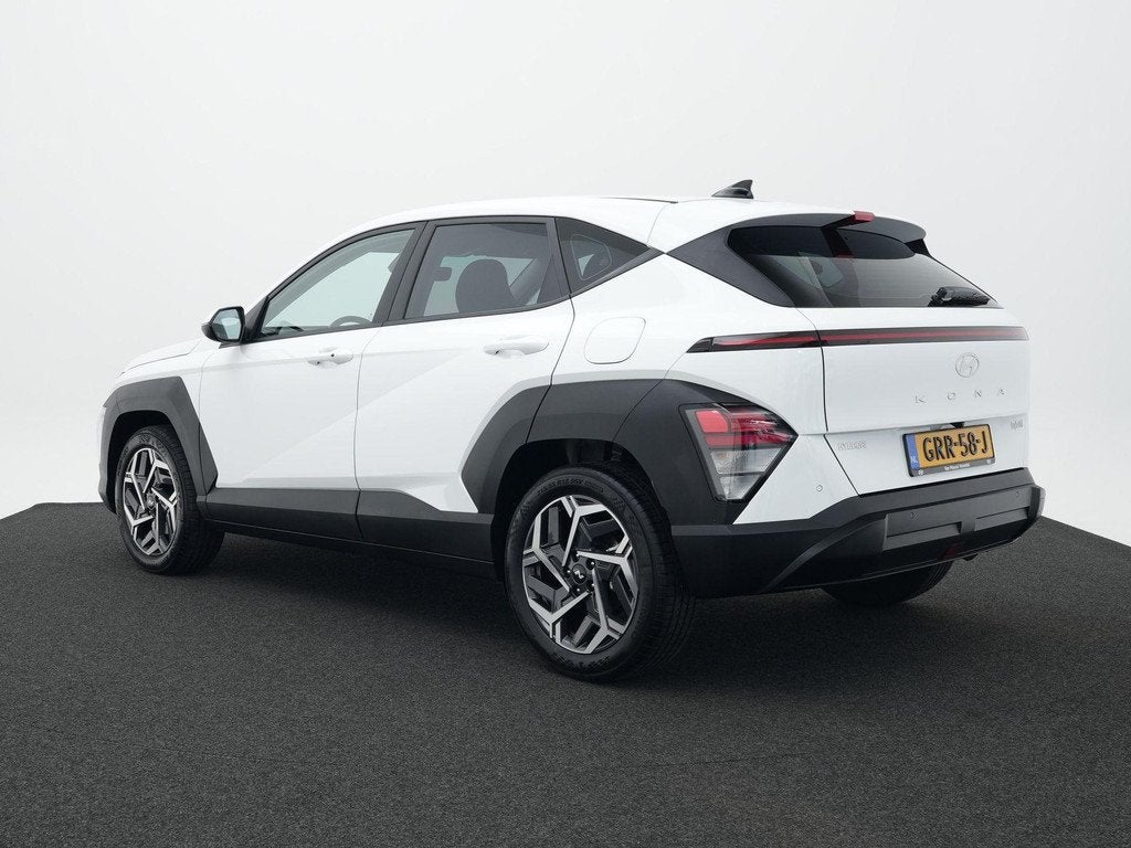 Hyundai Kona 1.6 GDI HEV Comfort | Achteruitrijcamera | Adap, Auto's, Hyundai, 12 maanden, Stof, Gebruikt, Wit