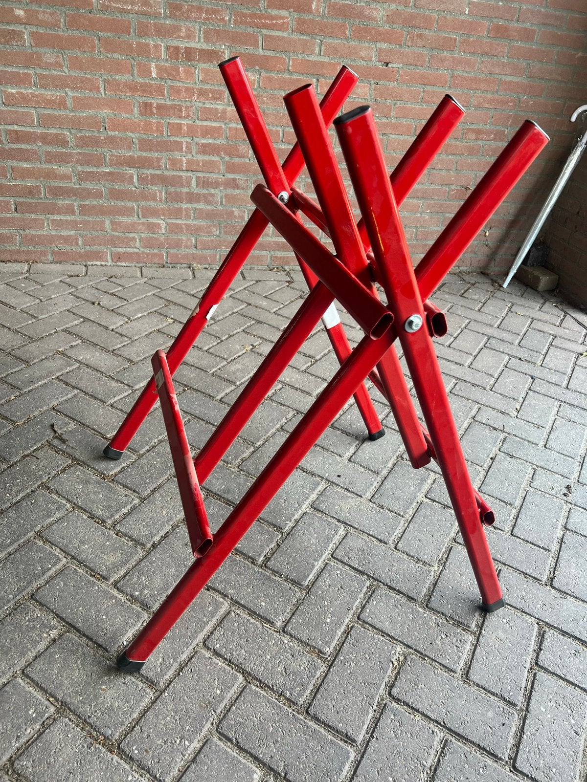 Nieuwe Rode Metalen Bok - Zaagbok/Werkbankondersteuning, Ophalen of Verzenden, Nieuw, Minder dan 70 cm, Inklapbaar