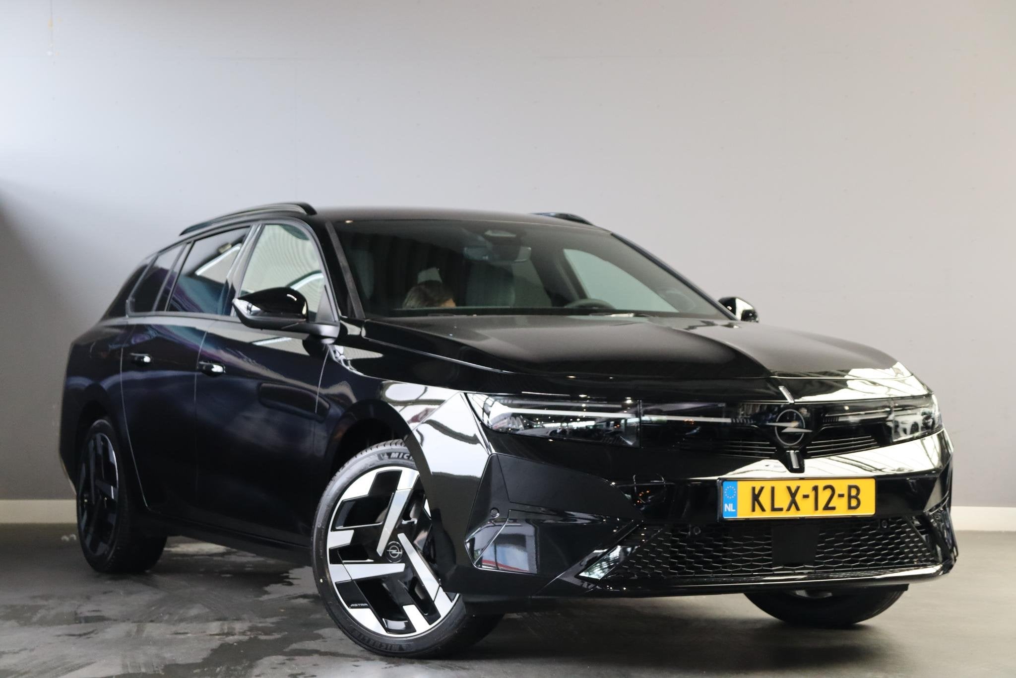 Opel Astra Electric 58 kWh Business Edition Achteruitrijcame, Stof, Automatische klimaatregeling, 200 min, 156 pk