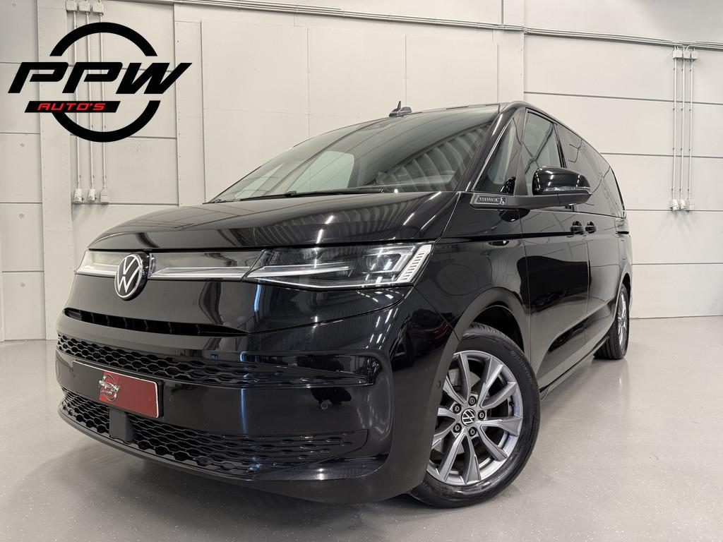 Volkswagen Multivan 1.4 eHybrid L2 Energetic 6p. PANO/TREKHA, Gebruikt, Zwart, Met garantie (alle), 7 stoelen