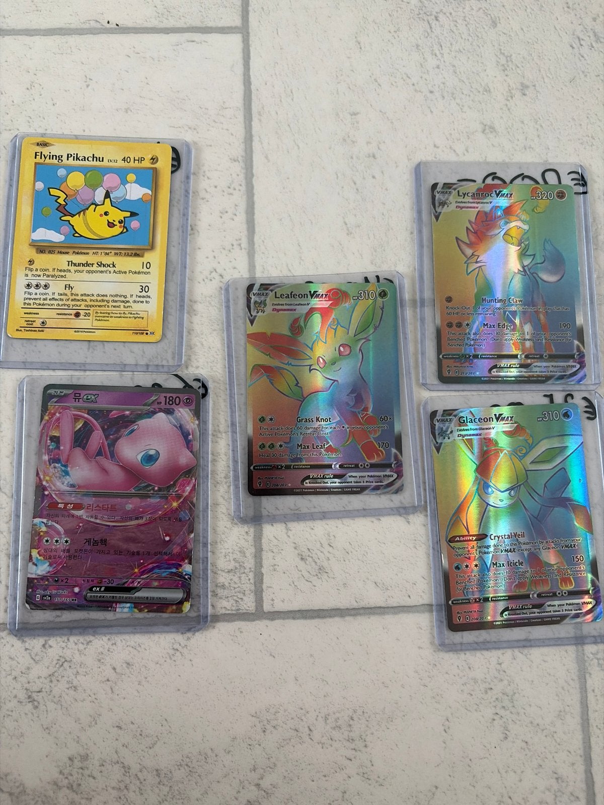 Zeldzame Pokémon kaarten: Flying Pikachu, Mew, Leafeon & Gla, Ophalen of Verzenden, Zo goed als nieuw, Meerdere kaarten, Foil