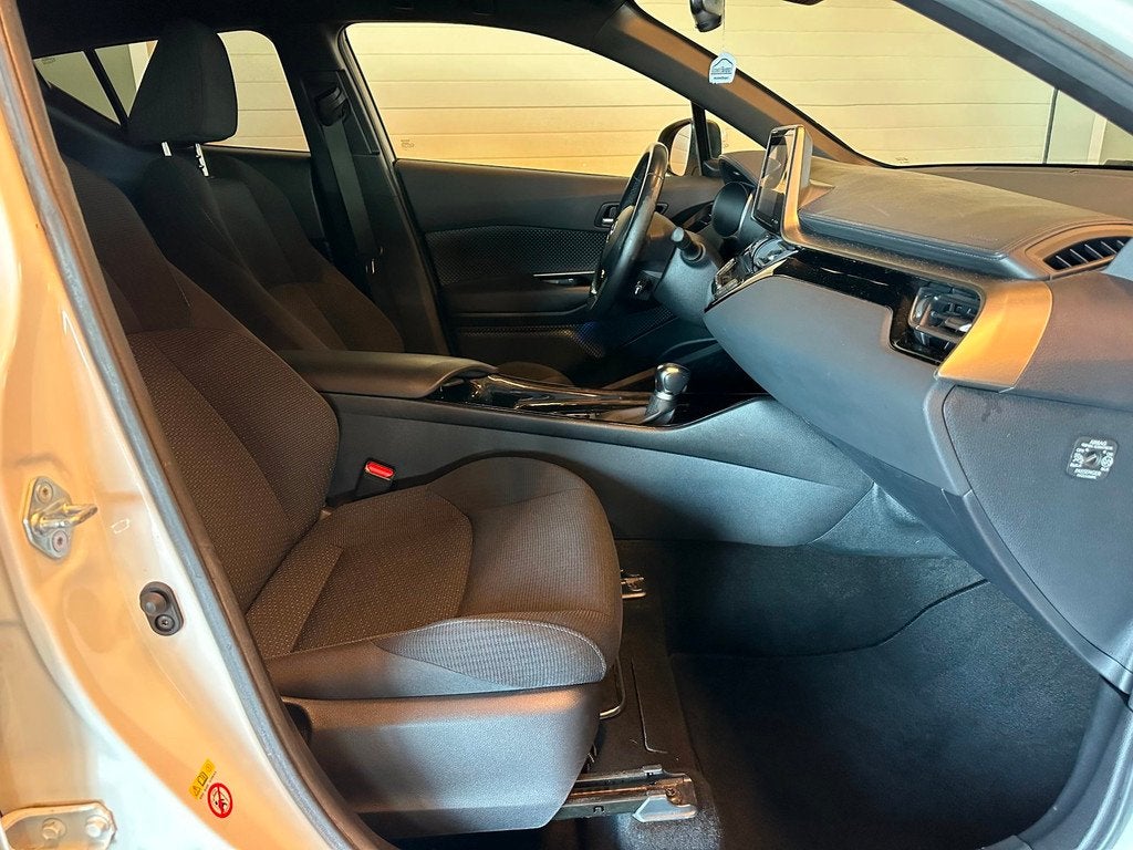 Toyota C-HR 1.8 Hybrid AUTOMAAT DYNAMIC-uitv/CLIMA AIRCO/LM-, Stof, 4 cilinders, Met garantie (alle), Wit