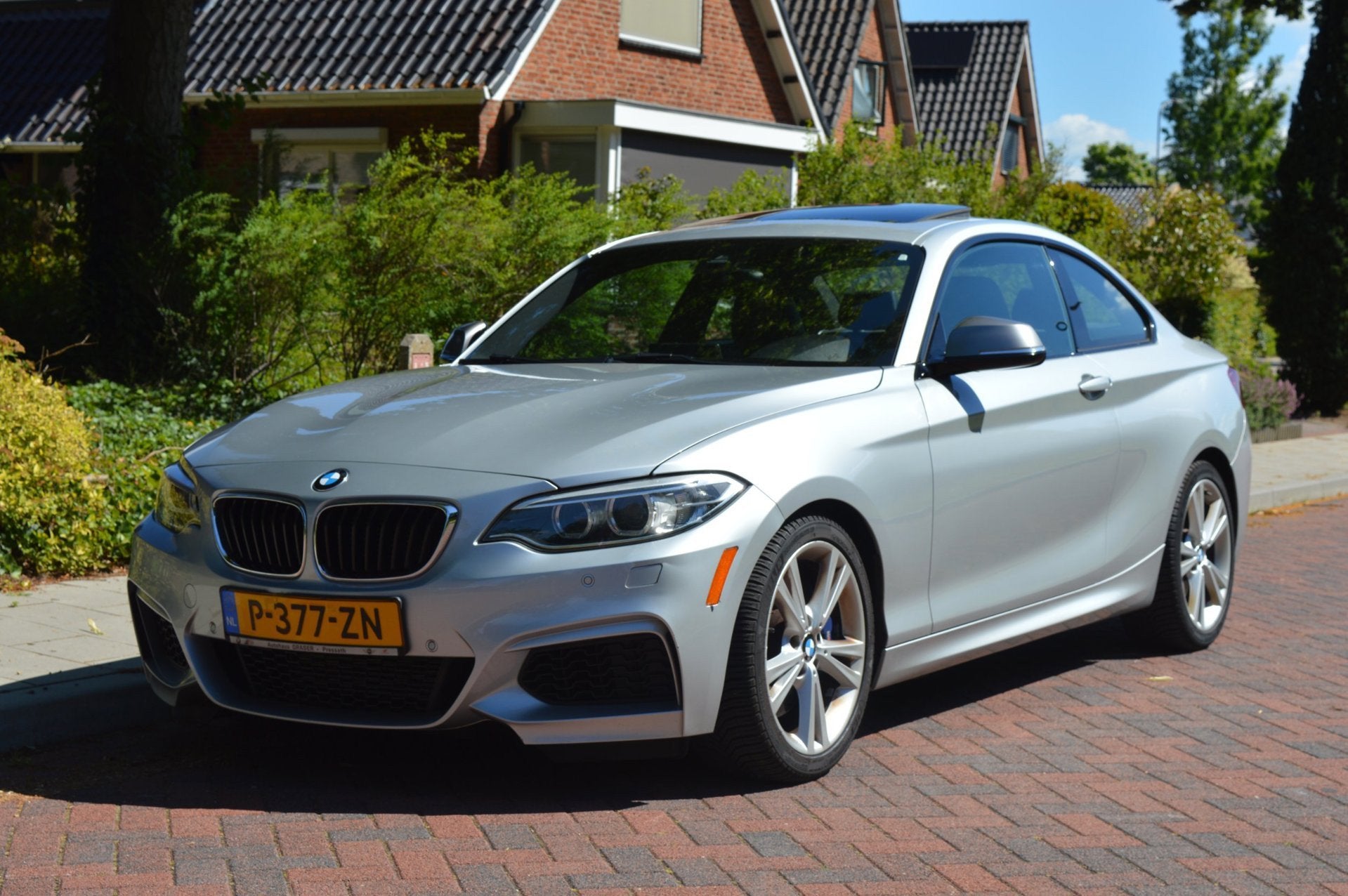 BMW 2-serie Coupé M235i Centennial High Exe schuifdak, Auto's, Automaat, Achterwielaandrijving, Gebruikt, 4 stoelen