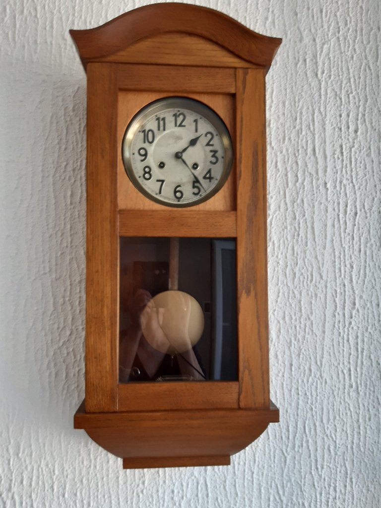 Junghans antieke klok, Ophalen
