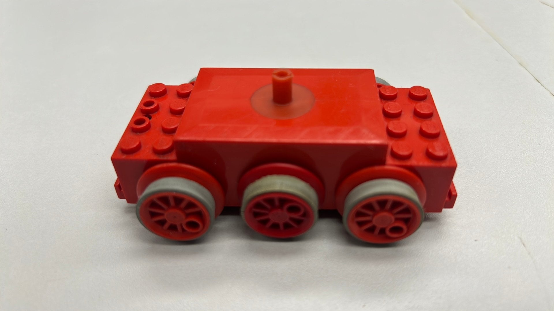 SB2960 Lego trein motor 12v rood 7865b, Ophalen of Verzenden, Zo goed als nieuw