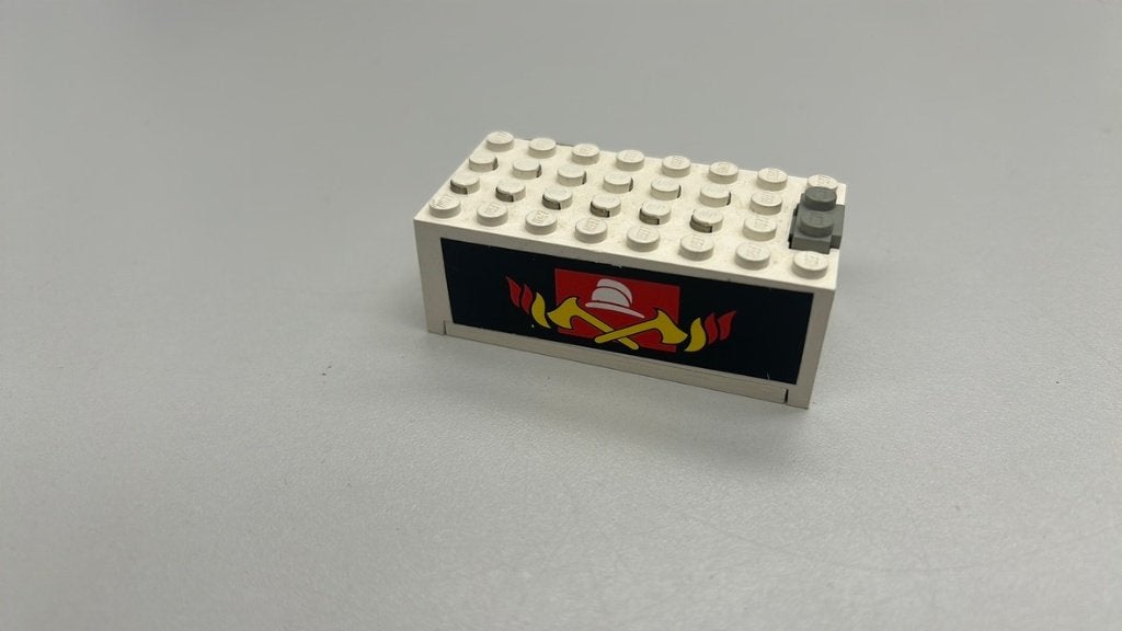 SB2877 Lego batterijbox 9 volt brandweer symbool 4760c01, Ophalen of Verzenden, Zo goed als nieuw
