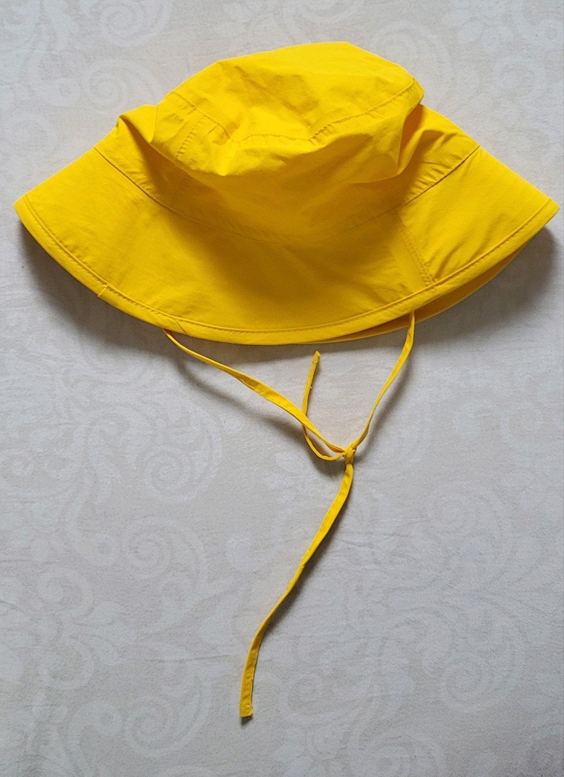 Geel regenhoedje - voor leeftijd 3/4 jaar - nieuw, Ophalen of Verzenden, Nieuw, Jongetje of Meisje, Hoed