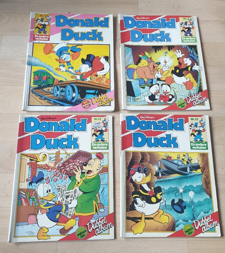 4 dubbel albums + 3x de grappigste verhalen van Donald Duck, Meerdere stripboeken, Verzenden, Zo goed als nieuw