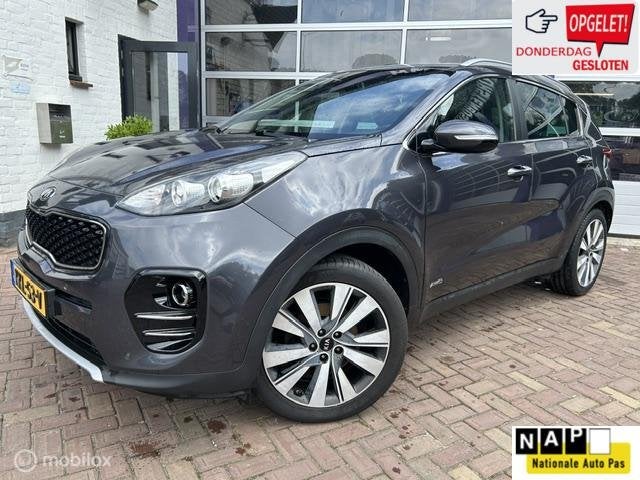 Kia Sportage 1.6 T-GDI 4WD Dynamic * AUTOMAAT * LEDER * NAVI, Auto's, Gebruikt, 4 cilinders, Lichtsensor, Leder