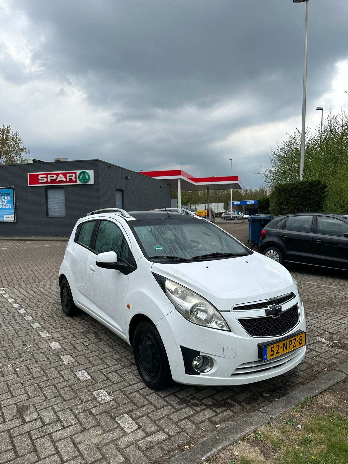 Chevrolet Spark 1.0 Bifuel 2010 Wit, Auto's, 15 km/l, 37 €/maand, Zwart, 4 cilinders