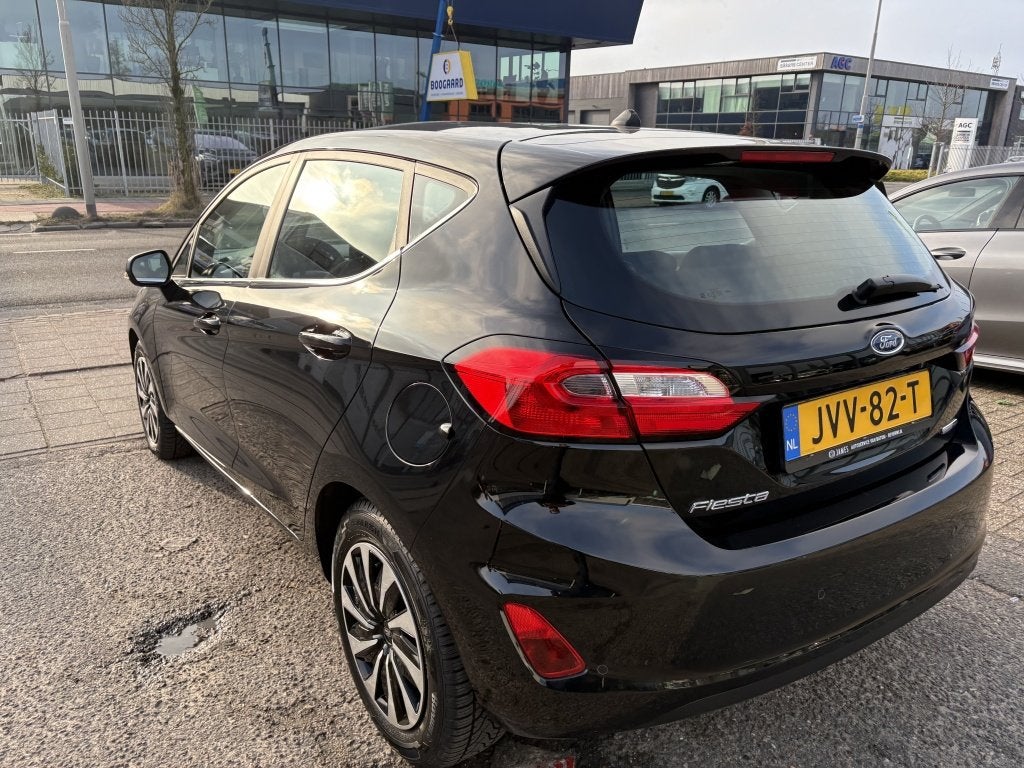 Ford Fiesta 1.0 EcoBoost Hybrid Titanium (bj 2023), Auto's, Voorwielaandrijving, Dealer onderhouden, Stof, Gebruikt