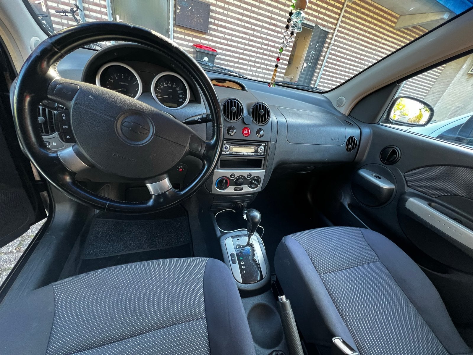 Chevrolet Kalos 1.4 16V Sedan AUT 2007 Zwart automaat, Auto's, Stof, 40 €/maand, 4 cilinders, Zwart