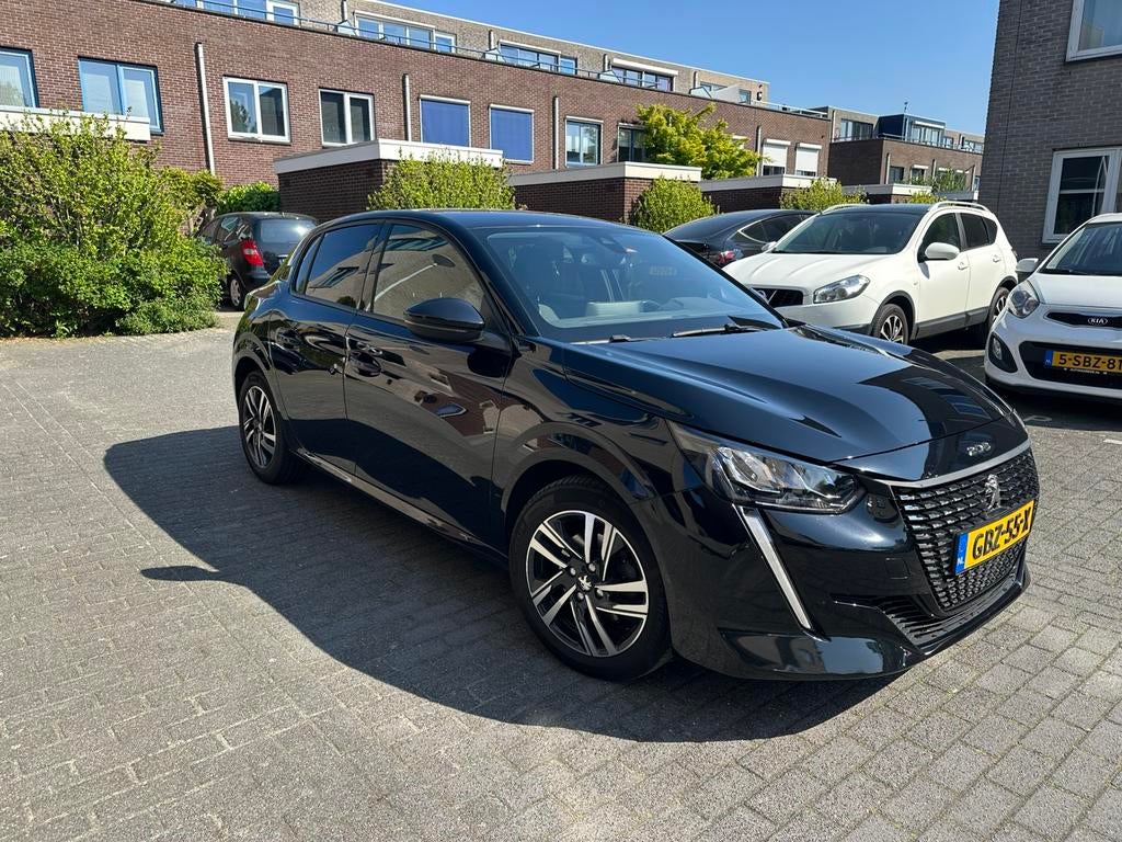 Peugeot 208 allure 1.2 Puretech 100pk 2021 Zwart, Auto's, Voorwielaandrijving, 100 pk, Zwart, 1200 kg