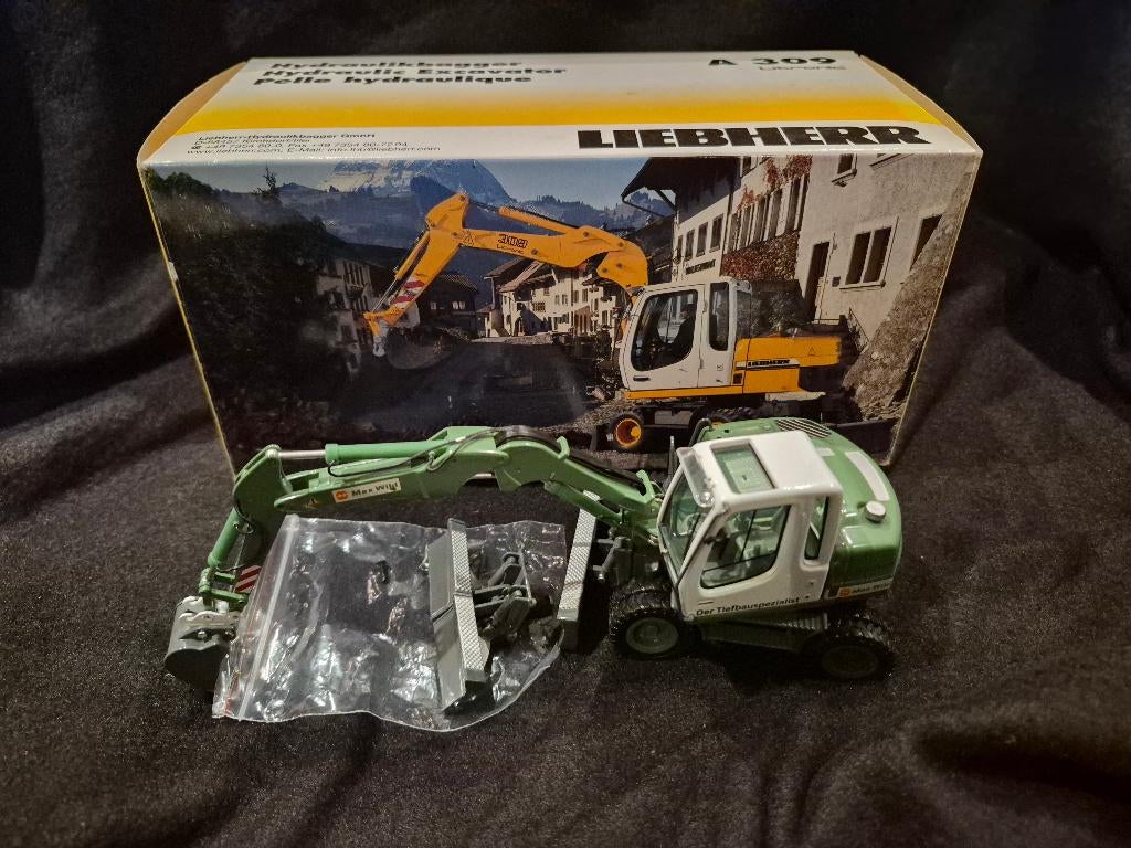 NZG 605/08 Liebherr A309 MAX WILD, Ophalen of Verzenden, Zo goed als nieuw, Hijskraan, Tractor of Landbouw, NZG