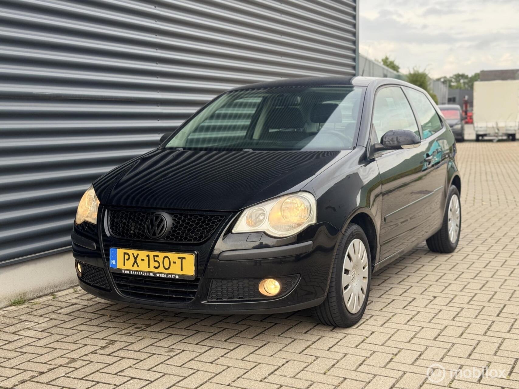 Volkswagen Polo 1.4 Automaat Sportline/Stoelverwarming/Airco, Auto's, Volkswagen, 4 cilinders, Zwart, 14 km/l, Bedrijf