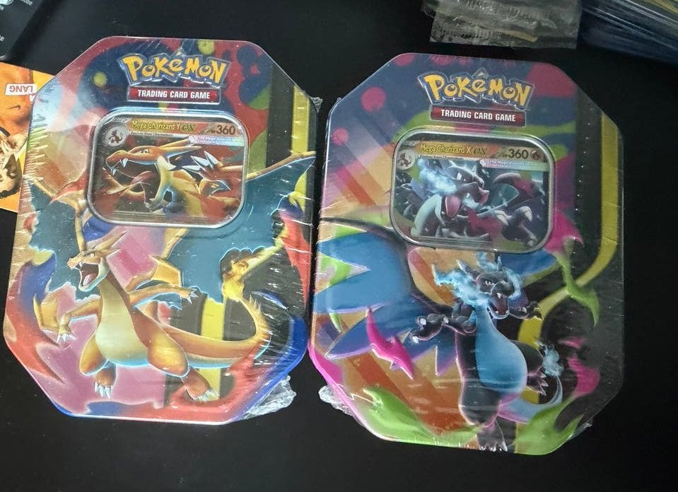 Sealed Mega Charizard X & Y Tins Pokemon, Ophalen of Verzenden, Nieuw, Overige typen, Foil