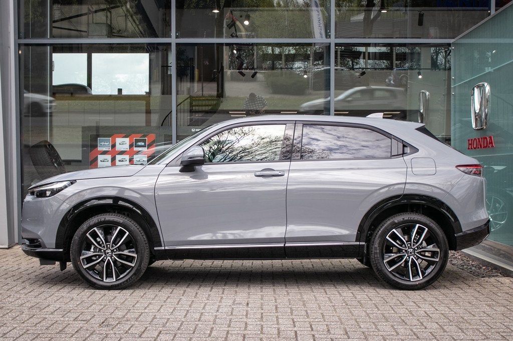 Honda HR-V 1.5 e:HEV Advance - Honda Sensing | Appl cp/Andro, Auto's, Honda, 1380 kg, Zwart, Leder en Stof, Origineel Nederlands