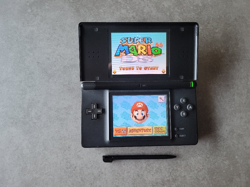 Nintendo Ds Lite met Oplader en Spellen., Spelcomputers en Games, Zwart, Ophalen of Verzenden, DS Lite, Gebruikt