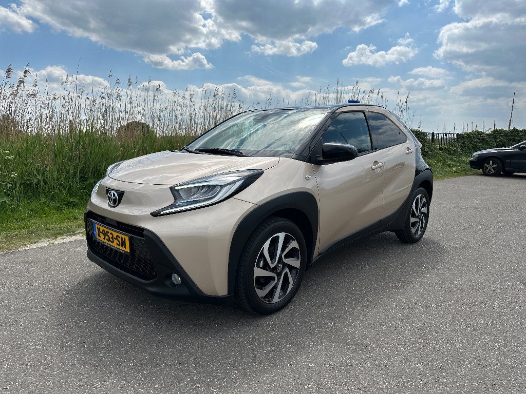Toyota Aygo X 1.0 Vvt-i-S VCT Pulse Automaat 2024, Stof, Bruin, 4 stoelen, Origineel Nederlands