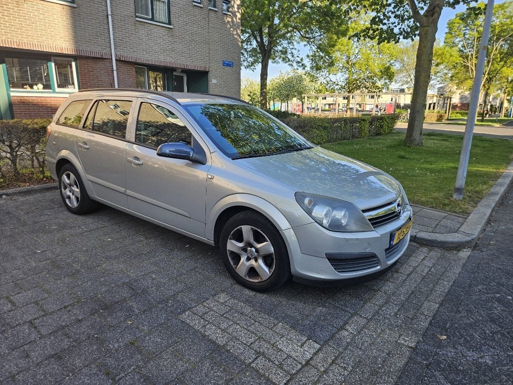 Opel Astra 1.6 16V St.wgn. 2006 Grijs, Auto's, Opel, Voorwielaandrijving, Zwart, 4 cilinders, Origineel Nederlands