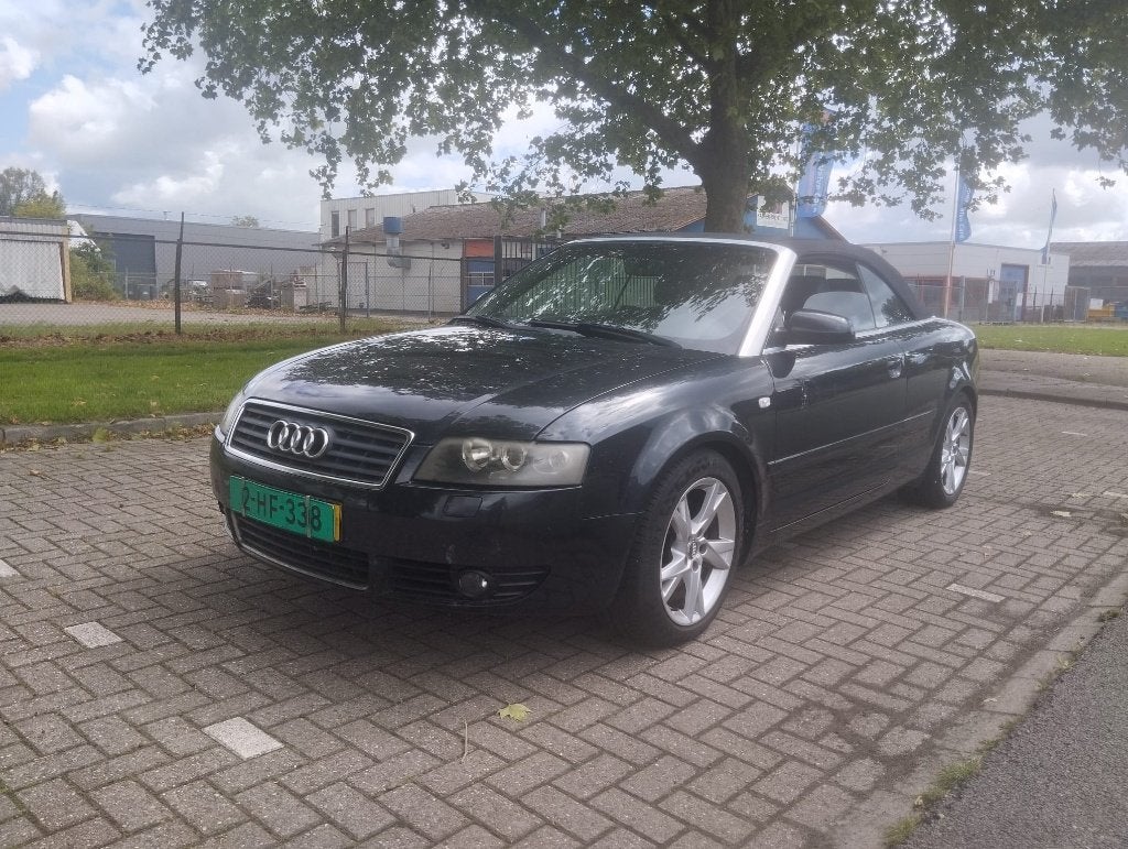 Audi A4 3.0 V6 162KW Cabrio AUT 2003 Zwart, Auto's, Audi, Open dak, Zwart, Cabriolet, 4 stoelen