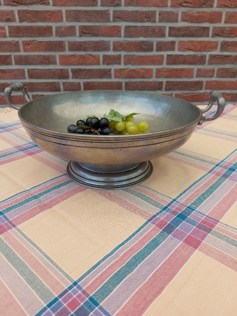 tinnen schaal met merktekens, Ophalen