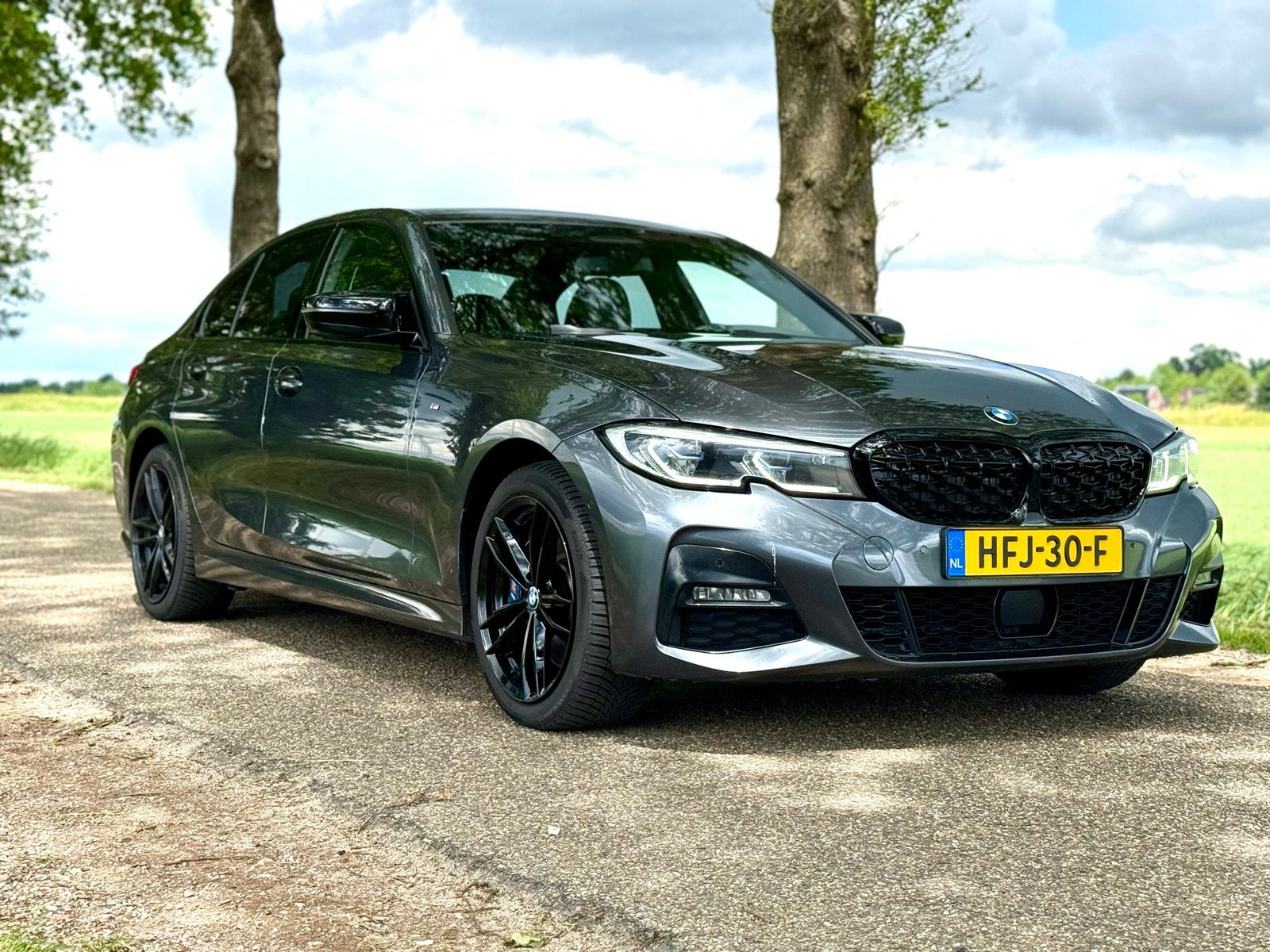BMW 3-Serie 330e 292pk Aut 2020 Grijs, Auto's, BMW, Automaat, 1998 cc, Achterwielaandrijving, Zwart
