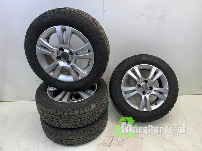 Velgen set + winterbanden van een Opel Corsa, Auto-onderdelen, Banden en Velgen, Gebruikt, -, -, Ophalen of Verzenden