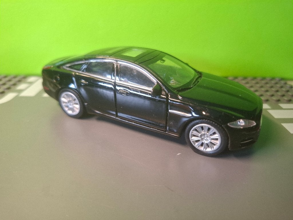Welly - Jaguar XJ [zwart] 1/43, Ophalen of Verzenden, Gebruikt, Auto, Overige merken