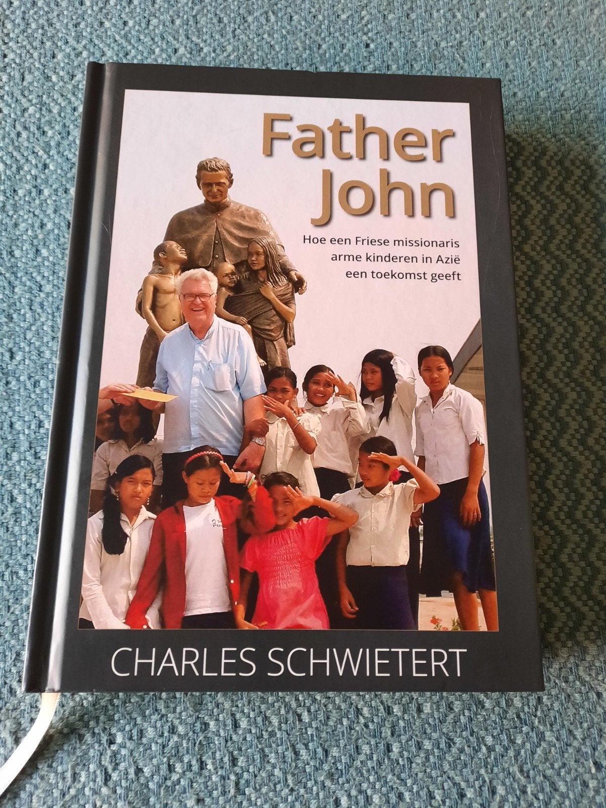 Father John: Hoe een Friese missionaris arme kinderen helpt, Ophalen of Verzenden