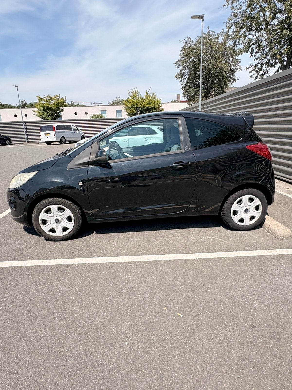 Ford Ka 1.2 51KW 2009 Zwart, Auto's, Voorwielaandrijving, Stof, 1242 cc, 4 cilinders