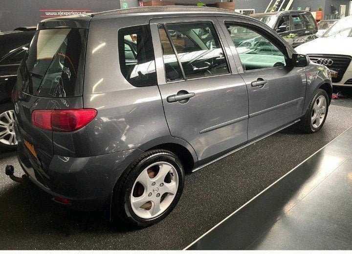 Mazda 2 1.6 16V Touring 2004 Grijs, Auto's, Voorwielaandrijving, 1596 cc, 4 cilinders, 49 €/maand