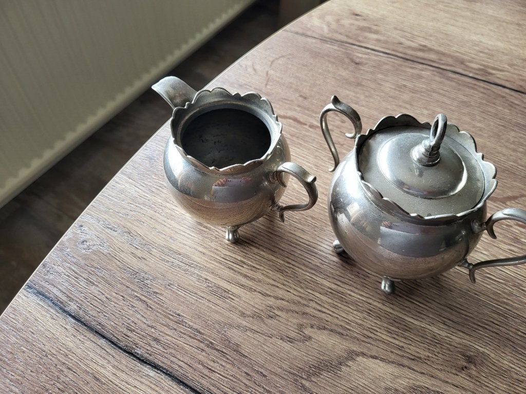 Verzilverd melkkannetje en suikerpot, Antiek en Kunst, Curiosa en Brocante, Ophalen of Verzenden